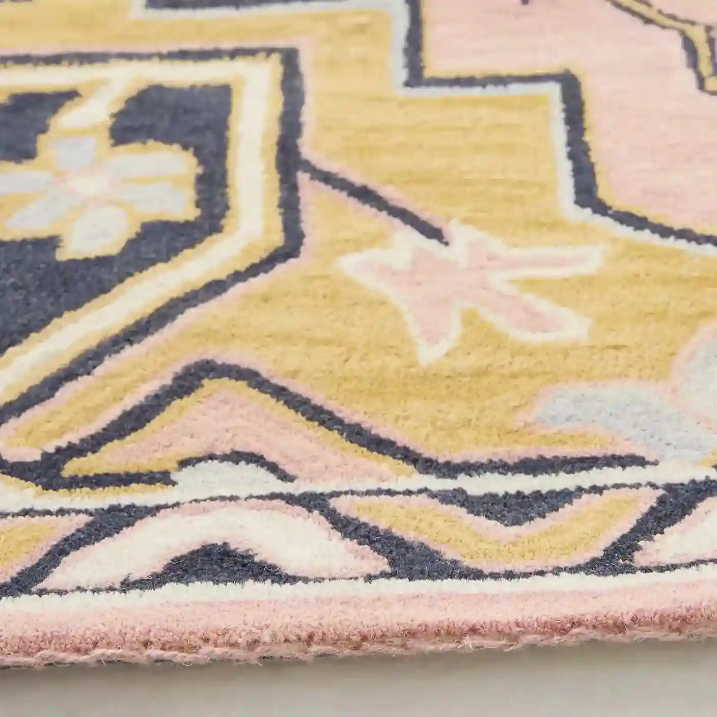 Vintage Floral Pink Rug styled in a cozy bedroom