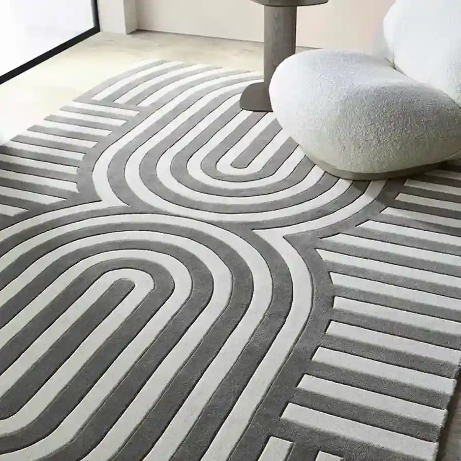 gray and white hand tufted solid rug