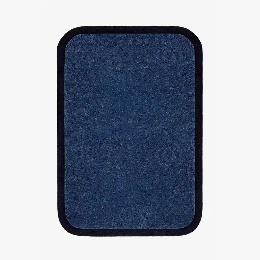 Solid Navy Border Hand Tufted Rug made from premium New Zealand wool, featuring a sleek black border and rich Navy color