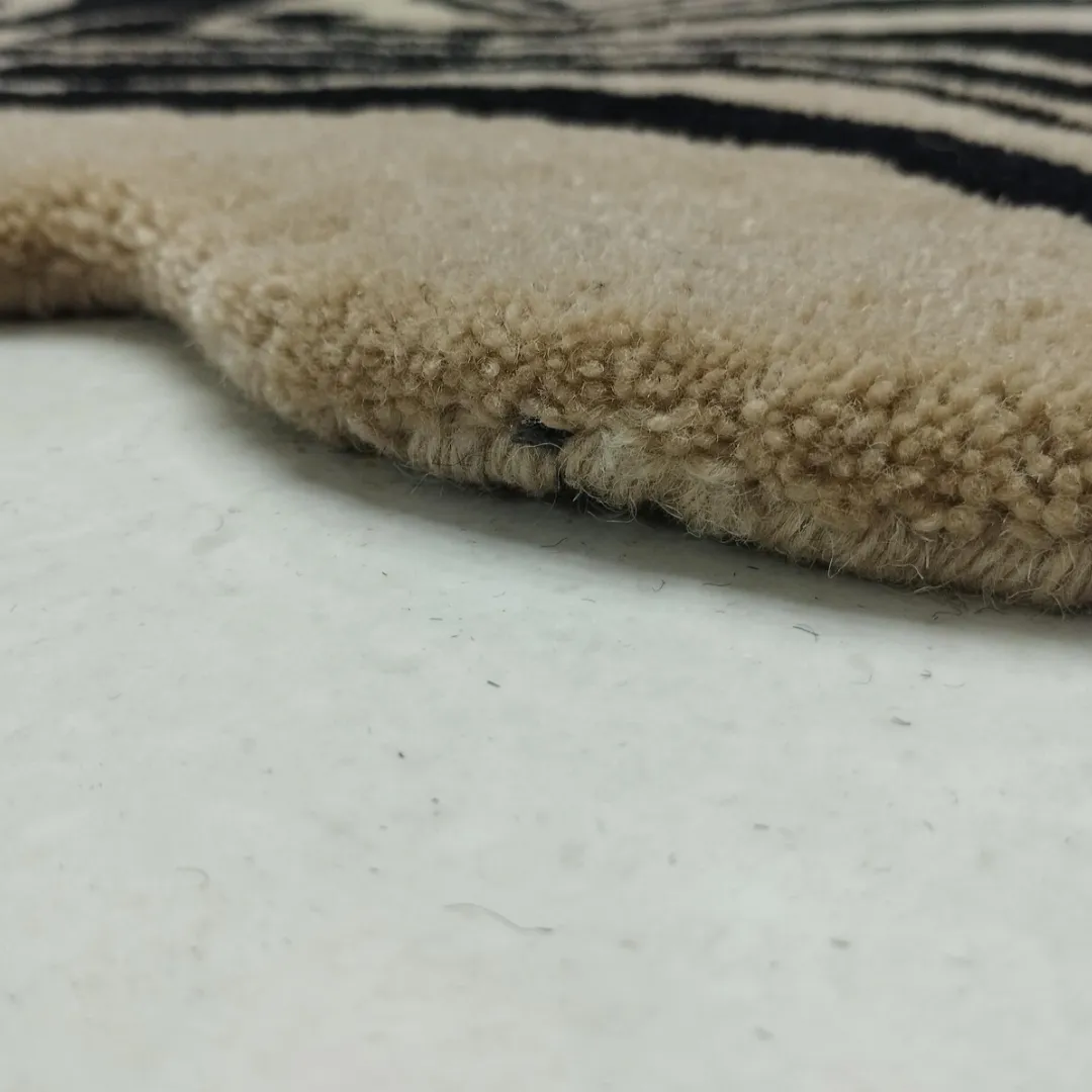 Freeform black runner rug in modern space