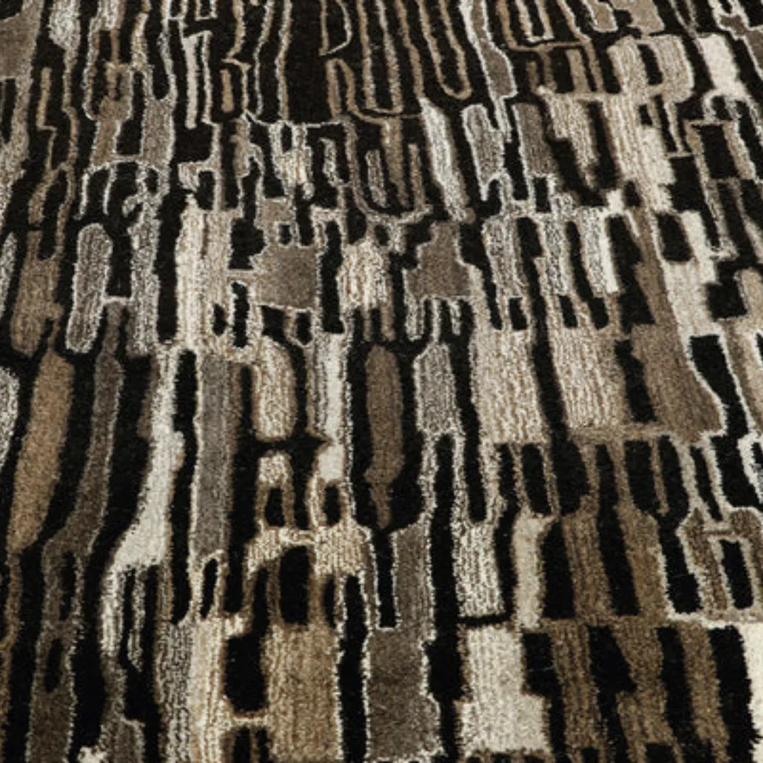 Black desert rug in cozy, neutral interior