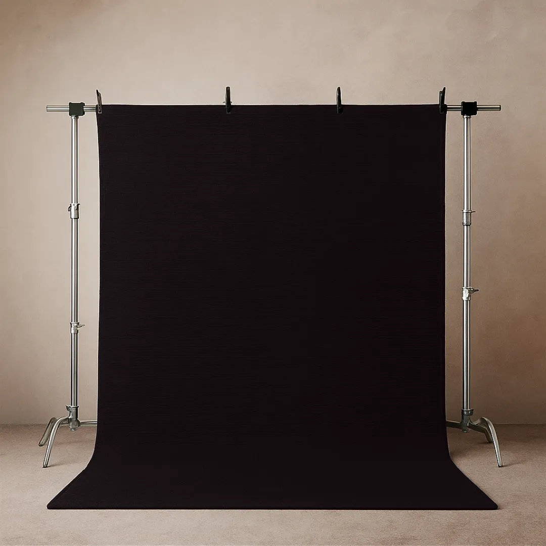 Deep black hand-tufted rug with sleek finish on hanger – discover black area rugs at Sneagear