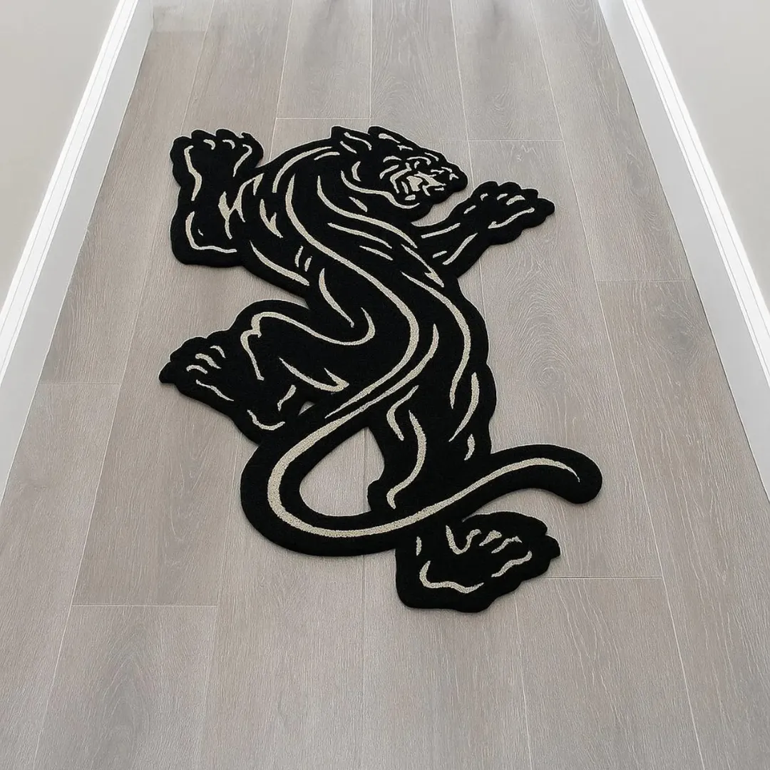 Black sculpted panther rug laid out in hallway