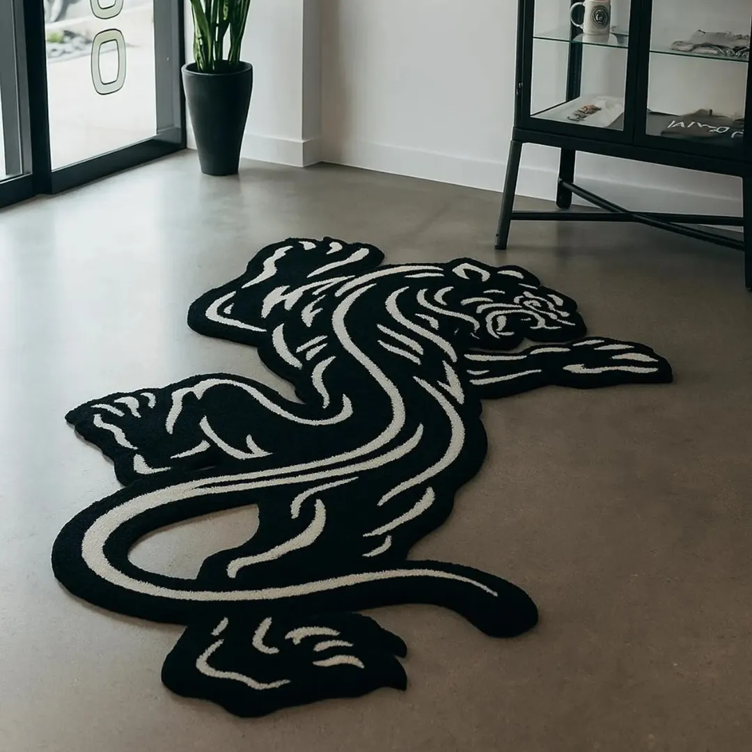 Tattoo panther rug as centerpiece in studio