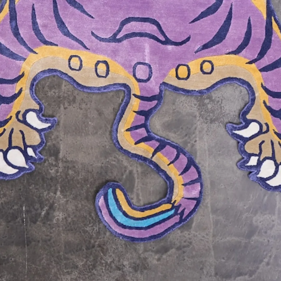 Hand-tufted wool purple rug featuring Tibetan tiger motif on a violet base