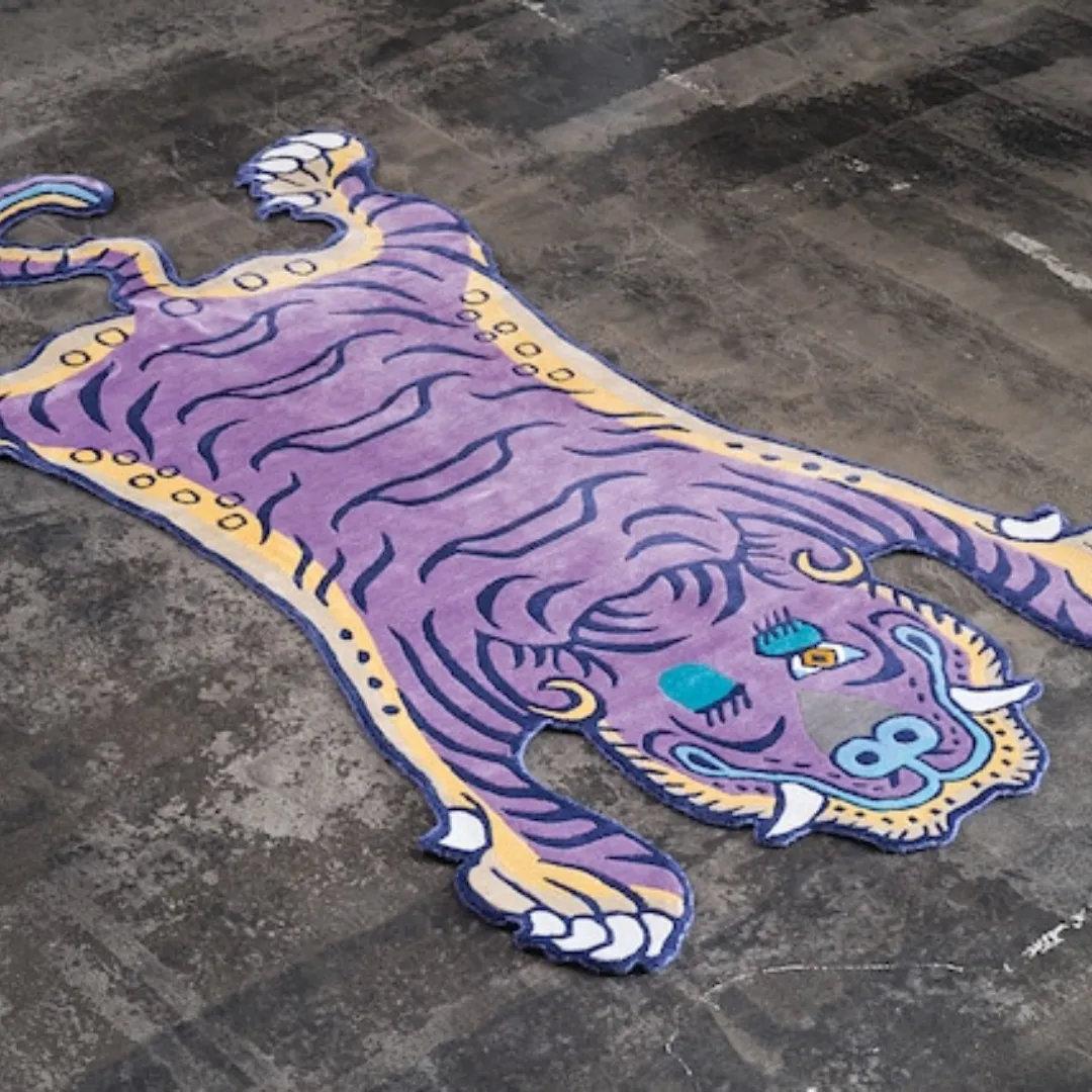 Purple Tibetan Tiger Rug with bold yellow, teal, and navy accents, featuring a traditional tiger design on a violet background