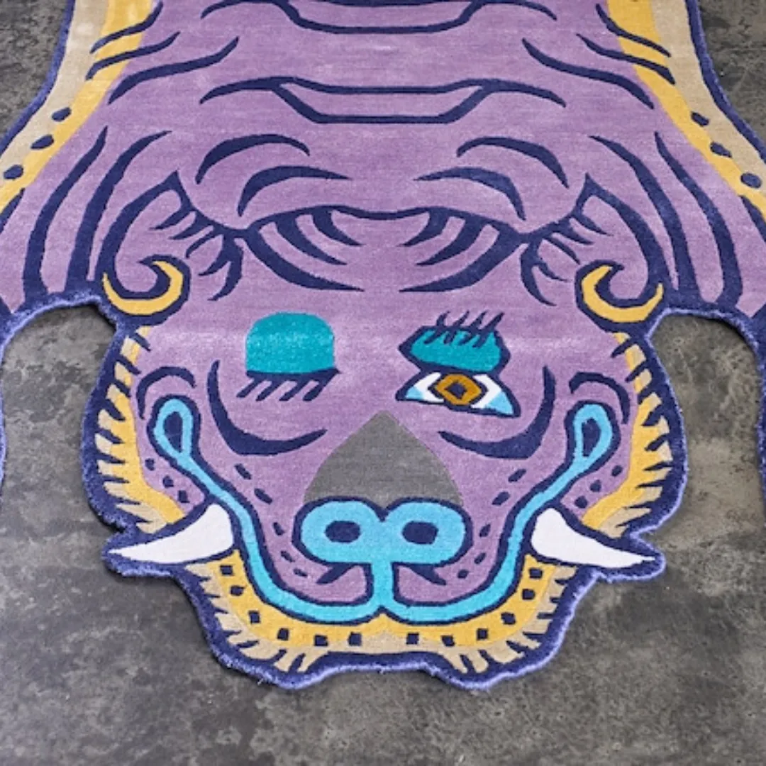 Side angle of plush Purple Tibetan Tiger Rug with symbolic animal print