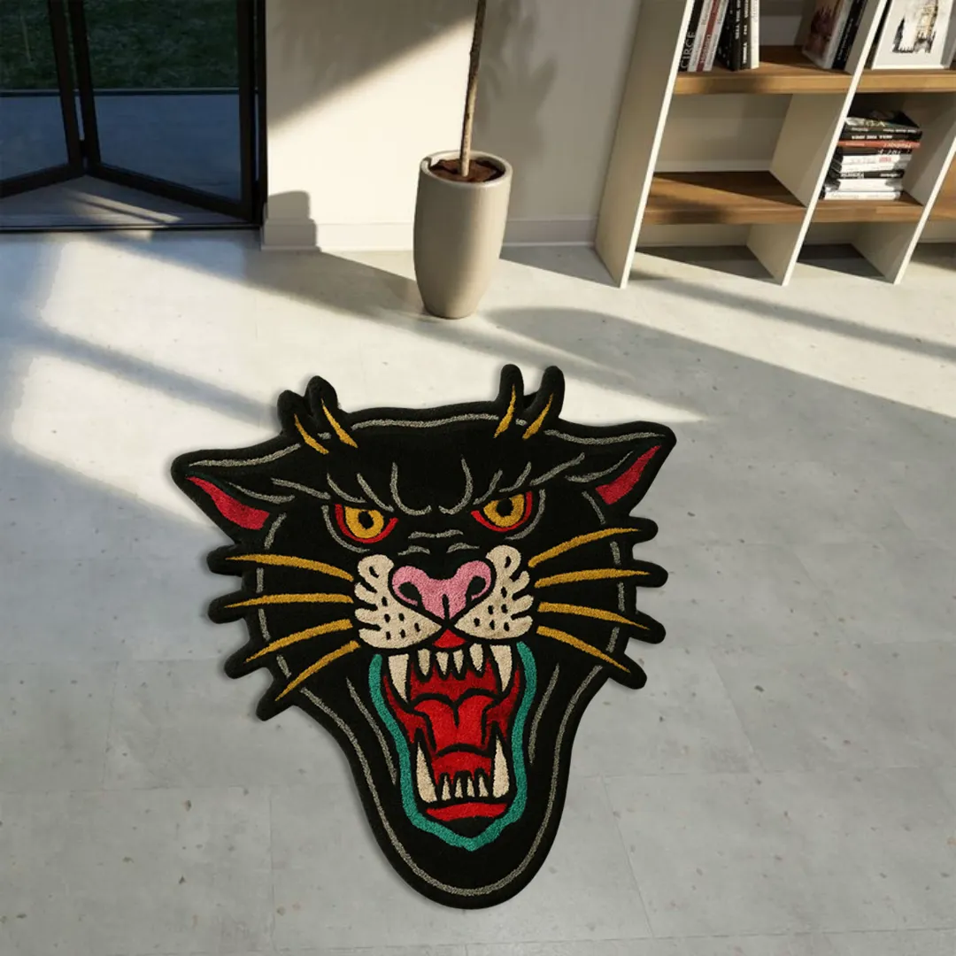Custom-shaped rug featuring roaring panther face in teal and red