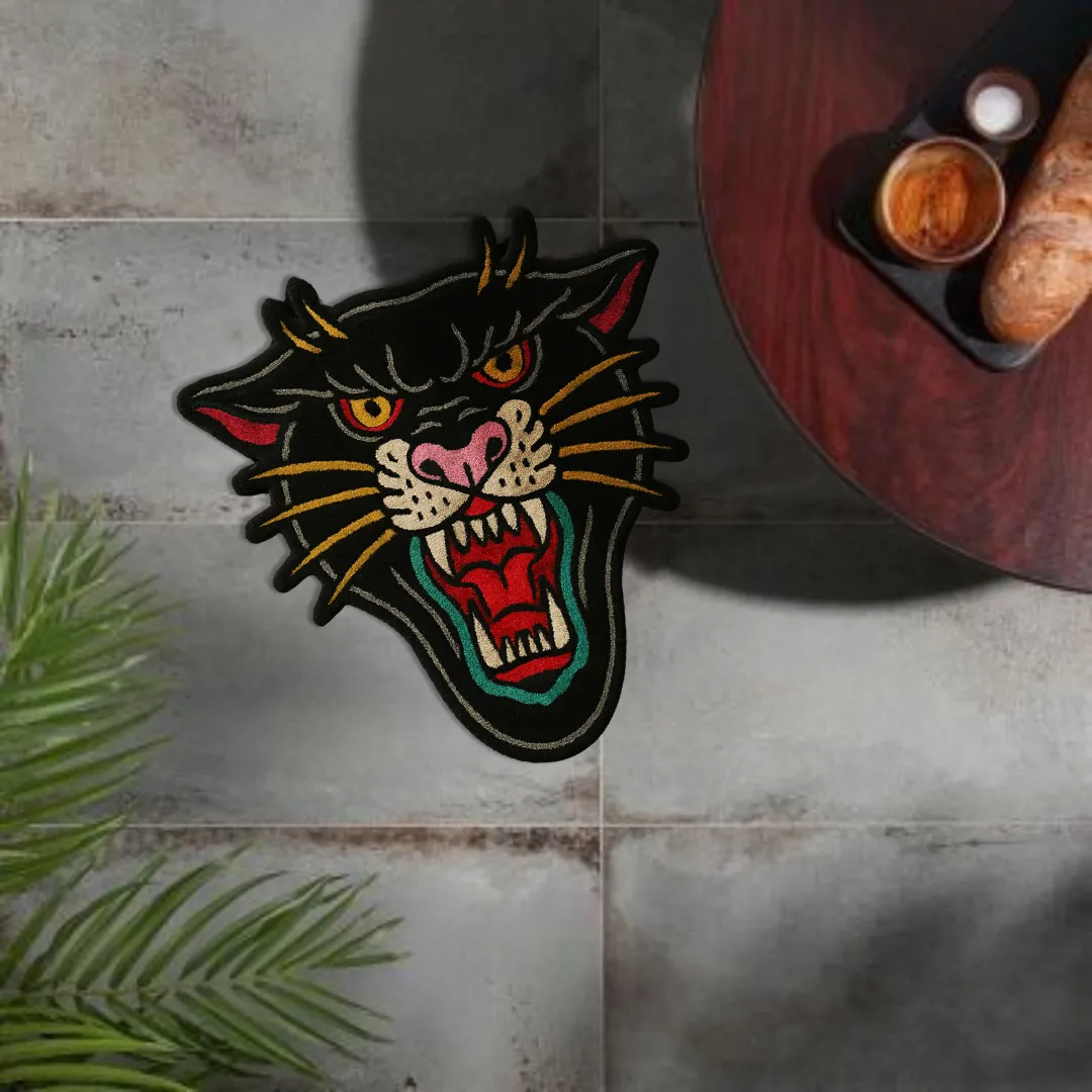 Tattoo-style panther rug with bold expression and colorful accents