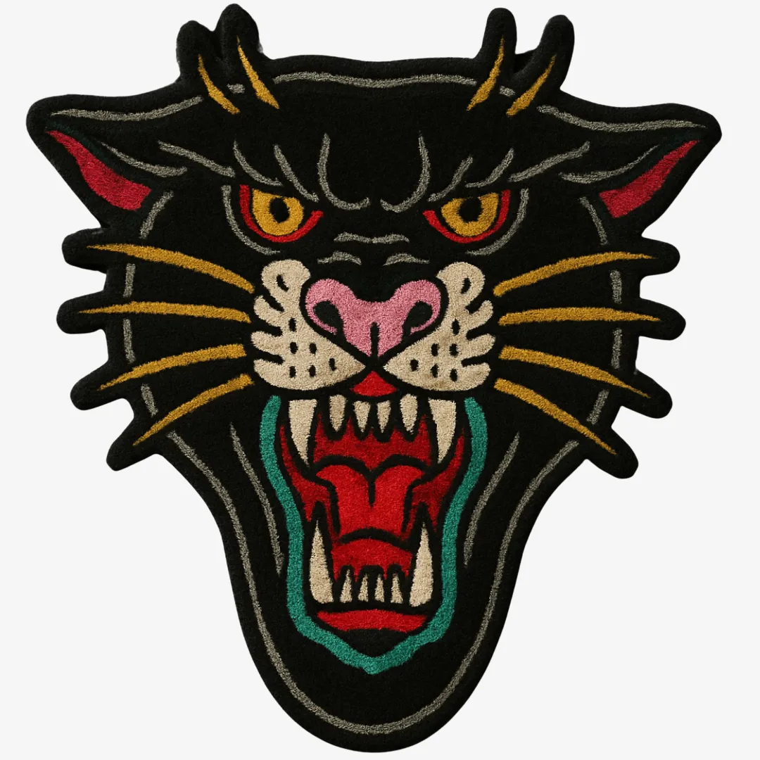 Black panther head rug with red mouth and yellow eyes