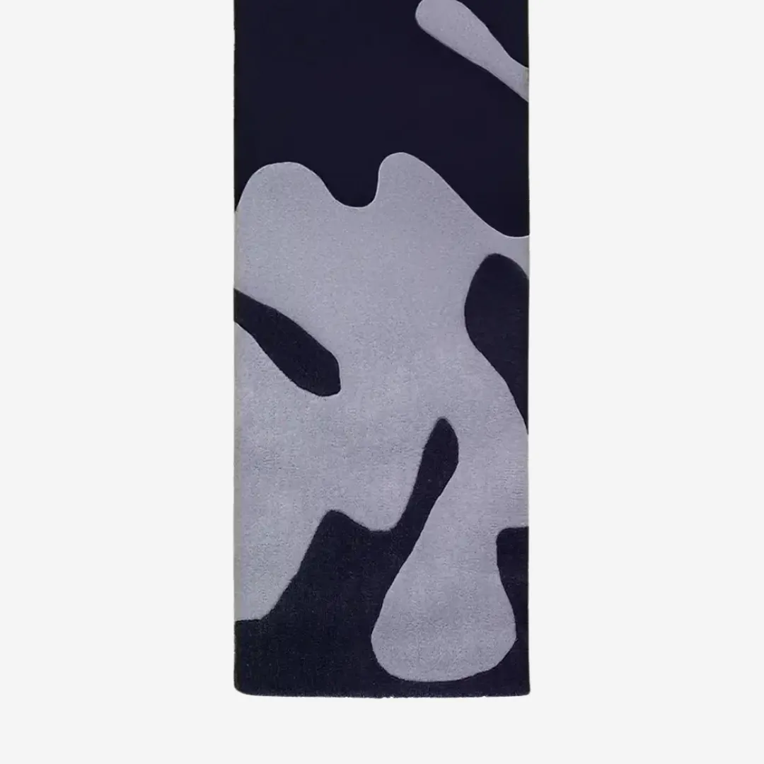 Shadow Camo Runner Rug with abstract black and gray camouflage design, styled for modern hallways