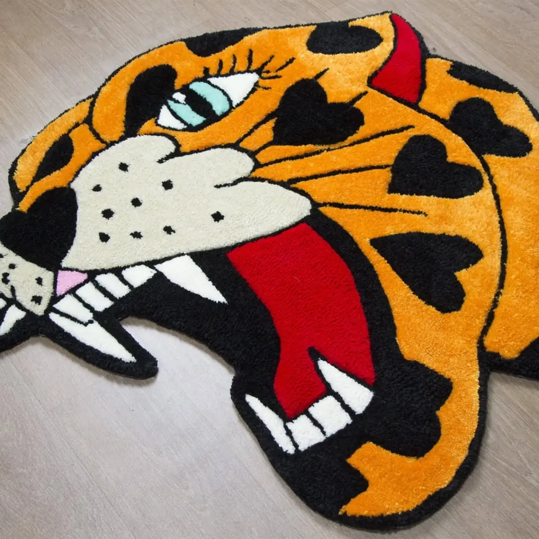 Wild Panther Heart rug styled in a bedroom setting, showcasing its fierce jaguar design and rich colors.