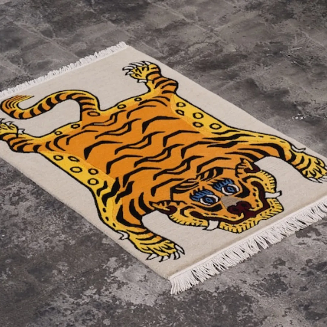 Beige Tibetan Tiger rug on grey floor
