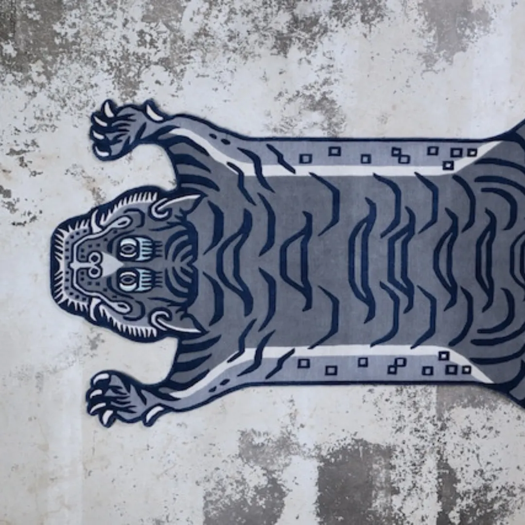 Close-up of hand-tufted wool on black tiger rug