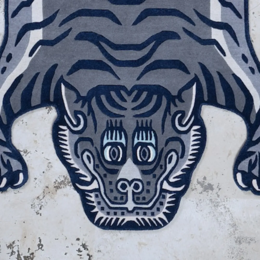 Close-up of hand-tufted wool on black tiger face rug