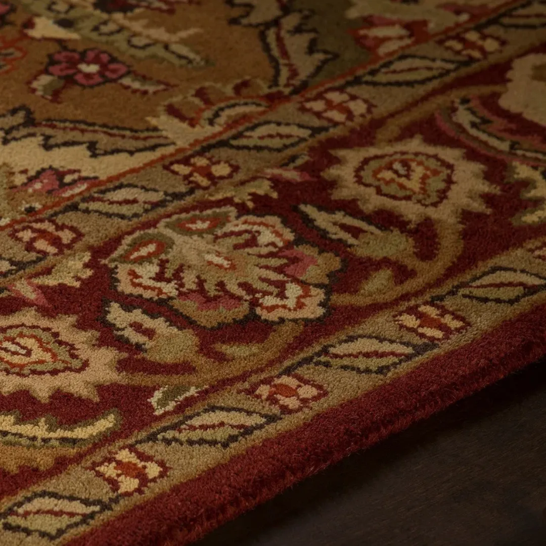 Unique hand-tufted rug in the shape of a colorful autumn leaf