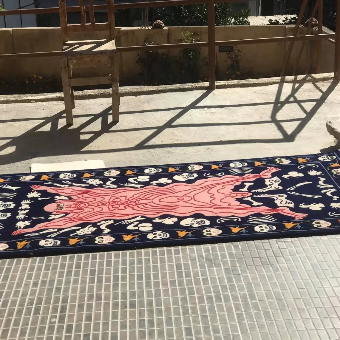 Bold demon tattoo rug styled in artistic, rebellious interior