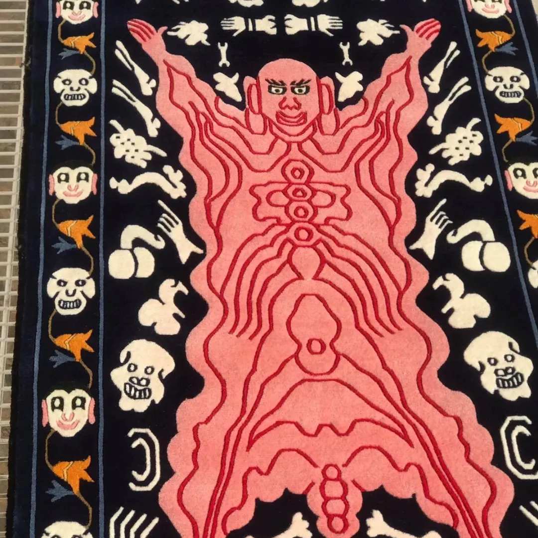 Bold demon tattoo rug styled in artistic, interior