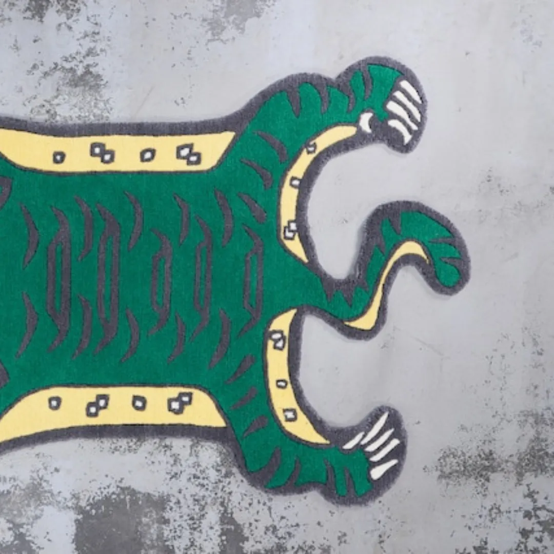 Close-up of hand-tufted wool texture on green tiger rug