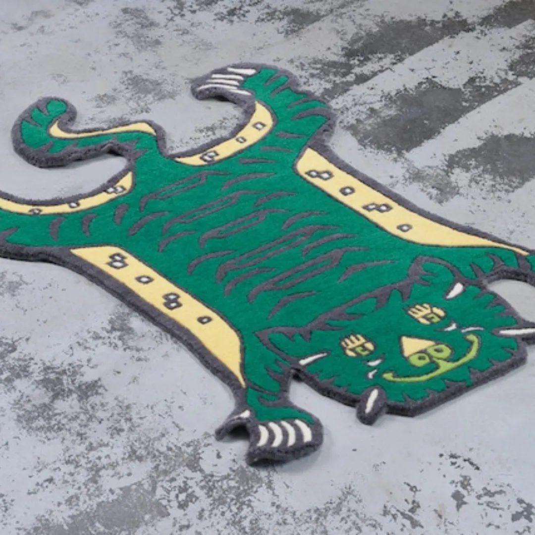 Green tiger rug in Tibetan-inspired shape with bold black stripes