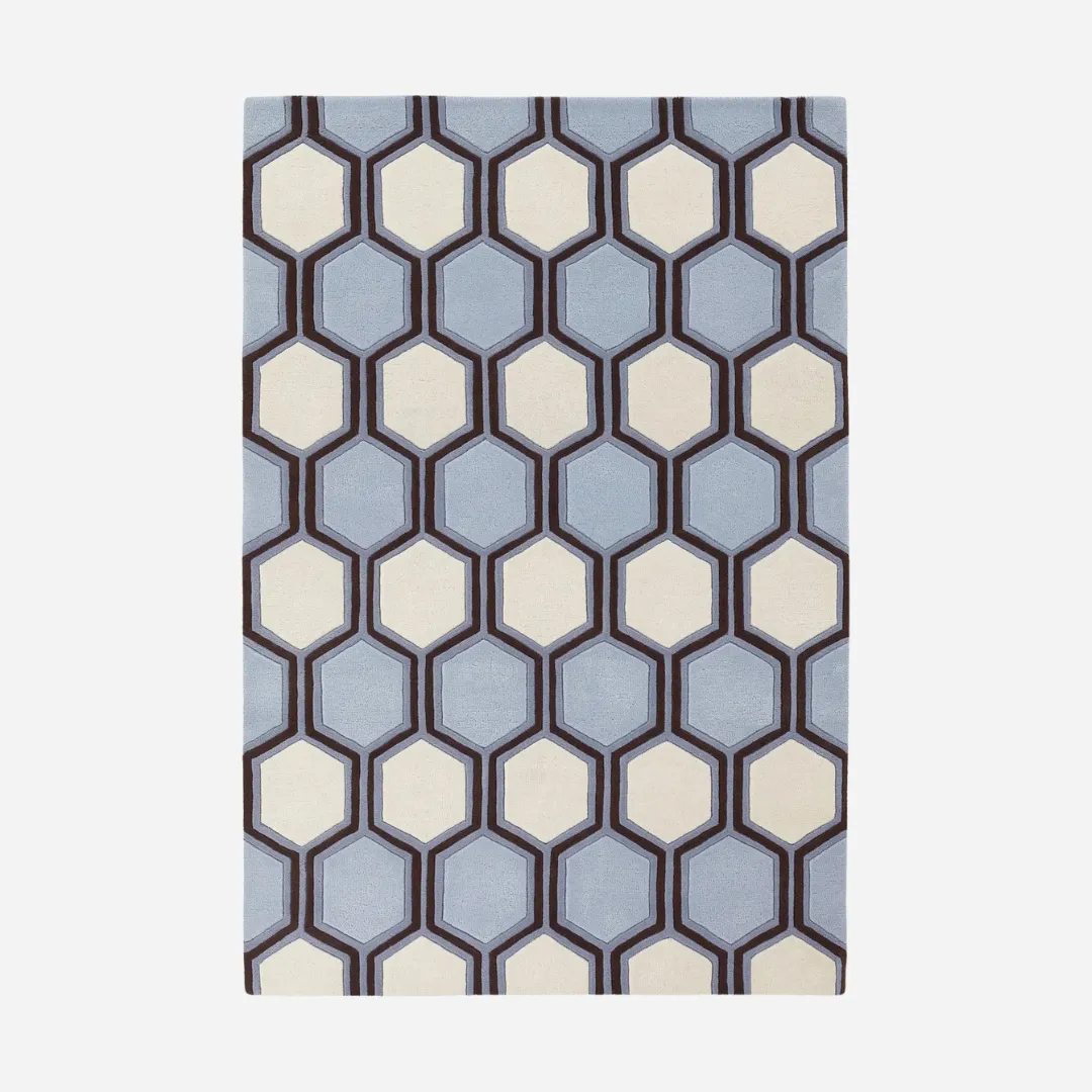 Geometric wool rug with hexagonal pattern in blue and white