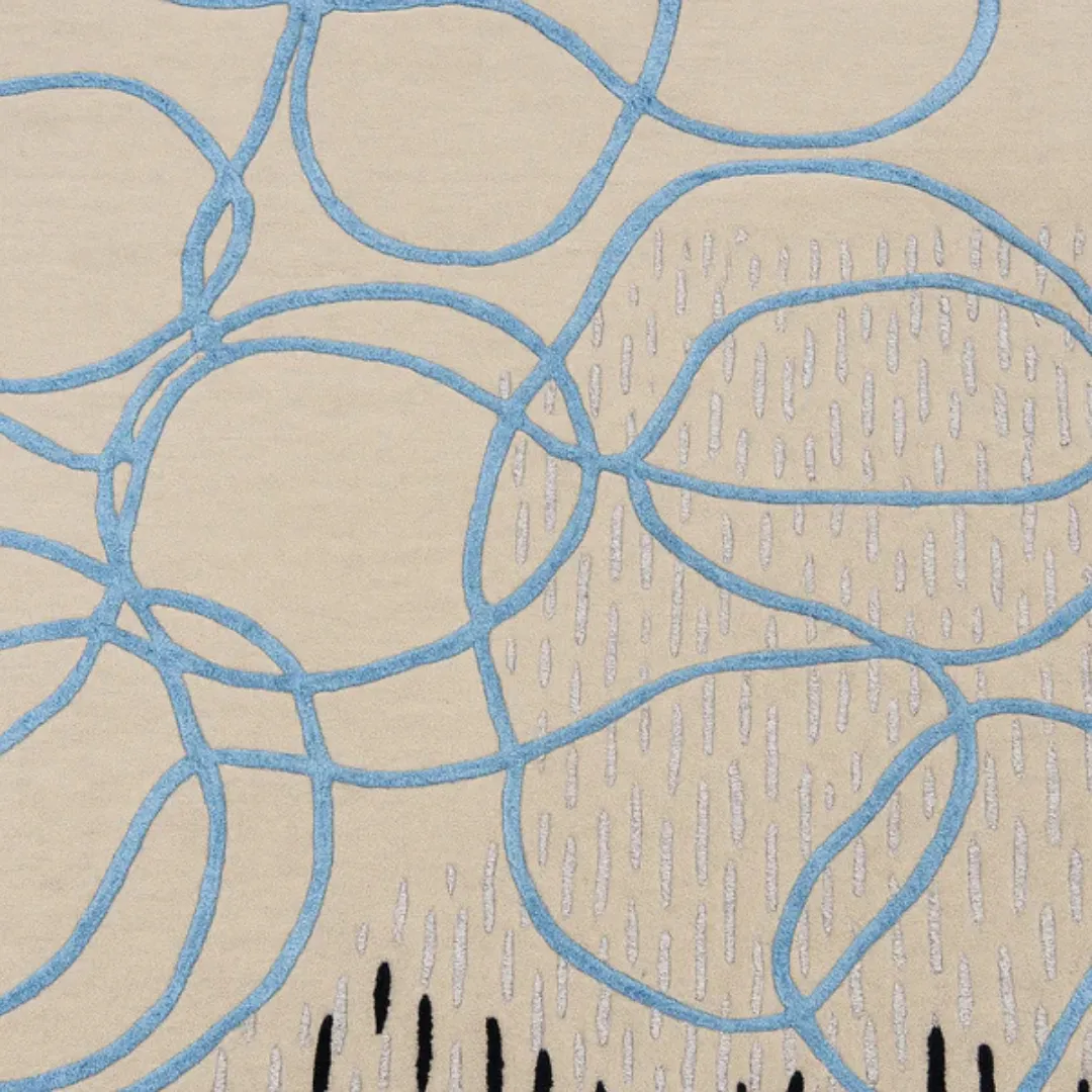 Close-up of abstract loop line pattern on wool rug