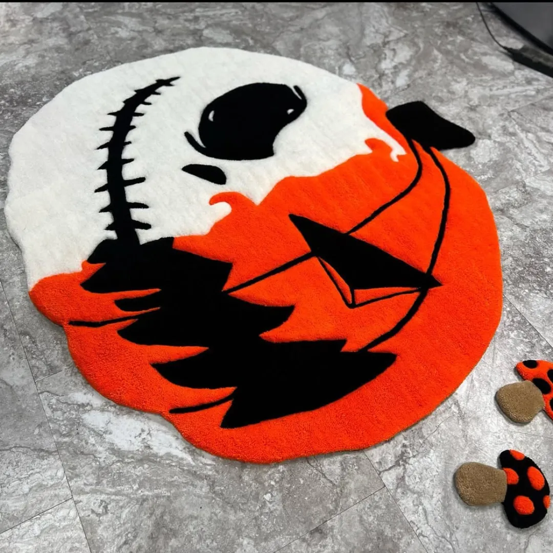 Handcrafted wool rug with pumpkin skull art for Halloween decor