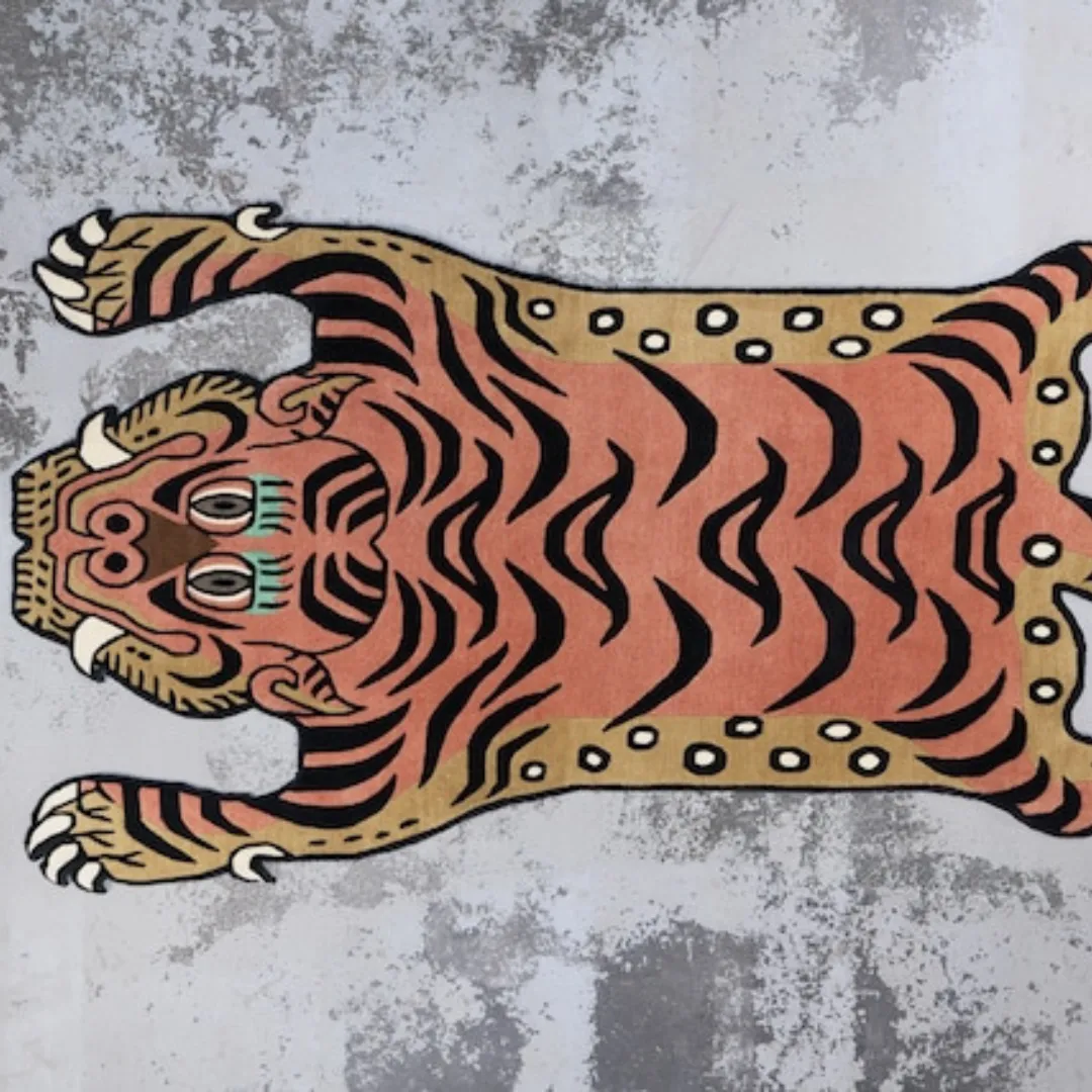 Unique and fierce tiger rug in rich browns, blacks, and oranges