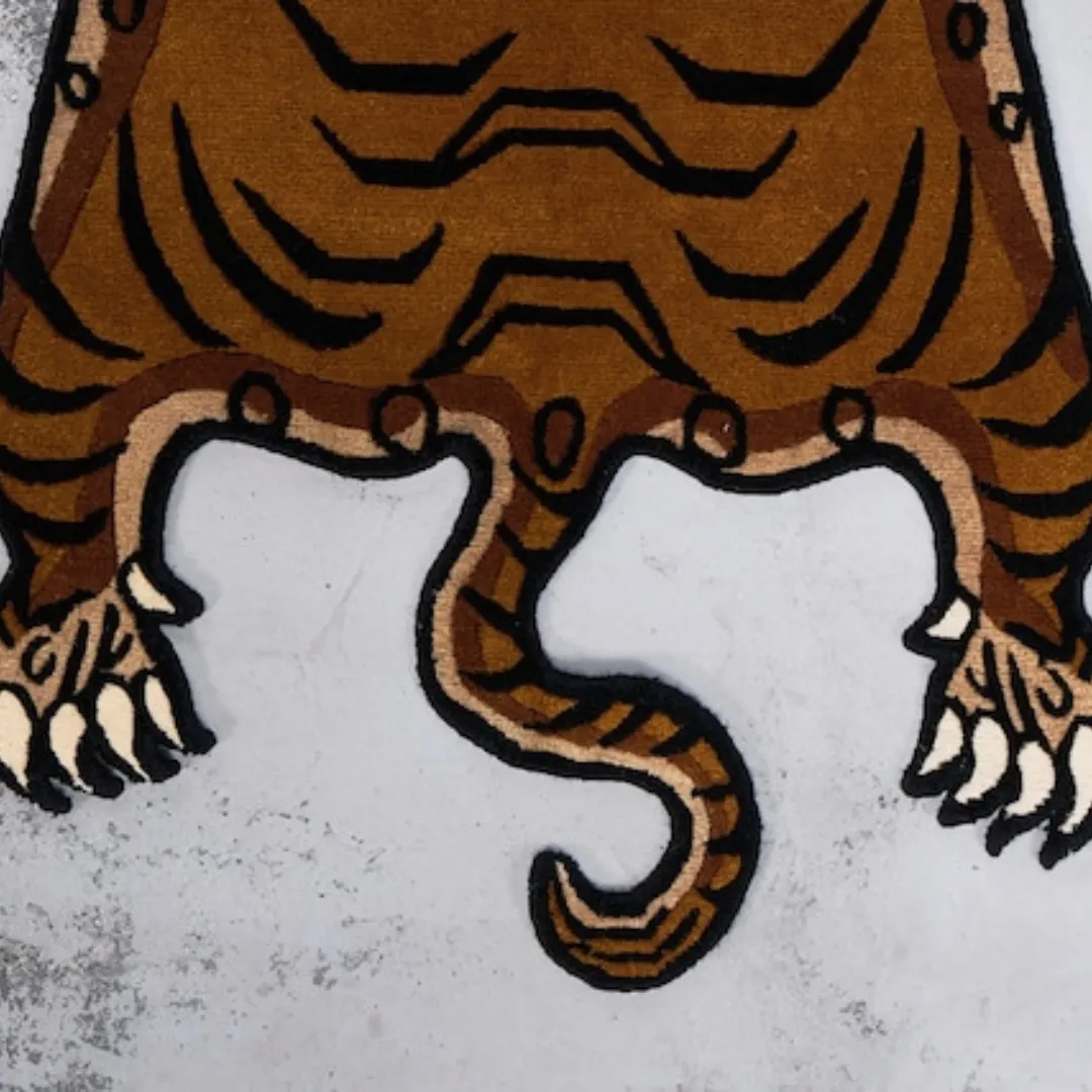 Close-up of the vibrant, hand-tufted Tibetan tiger rug