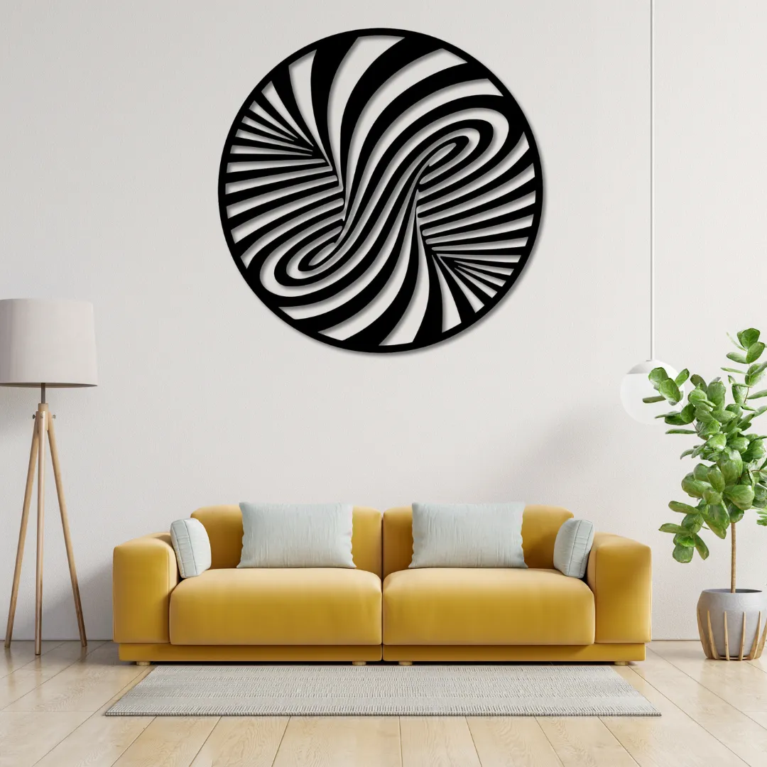 Abstract Spiral Silhouette Abstract spiral metal wall art above modern yellow sofa.