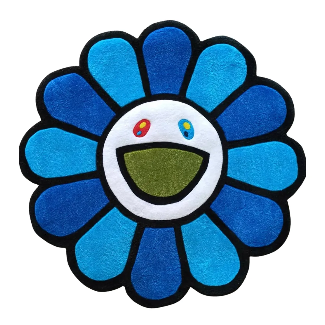 Blueberry Mirage Rug Blueberry Mirage Rug – Hand-tufted wool rug in rich blue shades with a joyful smiling face design, inspired by pop-art floral aesthetics.