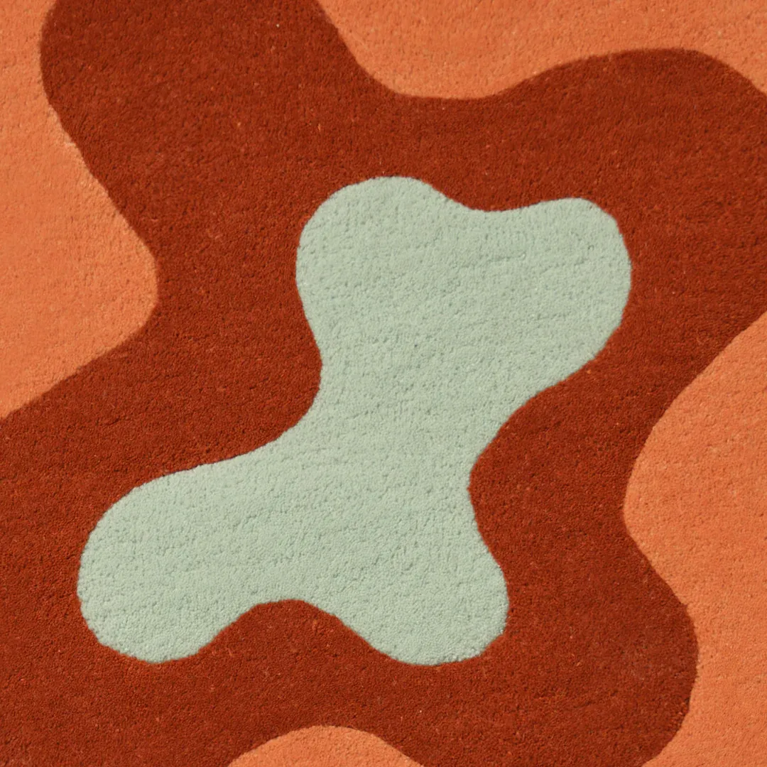 Ember Rug Hand-tufted Ember Flow Rug showcasing abstract layered wave design inspired by molten textures