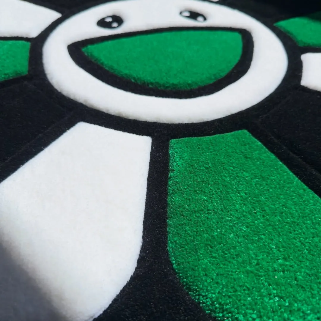 Emerald Bloom Takashi Rug Emerald Bloom Rug – Wool rug in deep green and white tones with a bold black outline, blending comfort with creative pop-art design.
