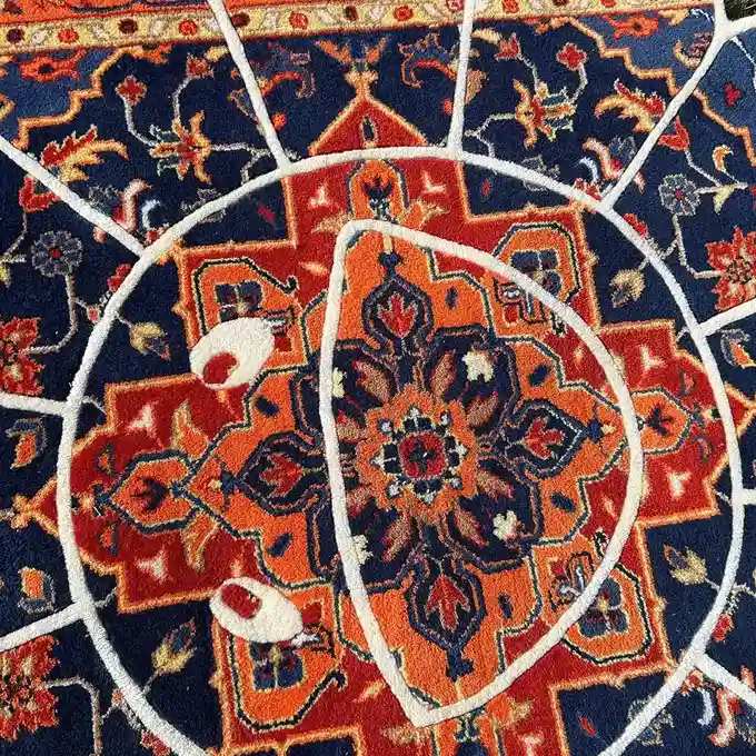 Regal Bloom Murakami Rug Handmade Regal Bloom Rug in navy and orange tones, inspired by Persian floral designs, offering both artistic beauty and cozy comfort.