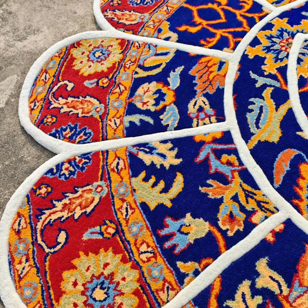 Whirl Takashi Rug Artistic Verdant Whirl Rug with contrasting halves of deep blue and neutral beige, featuring intricate hand-tufted floral detailing.