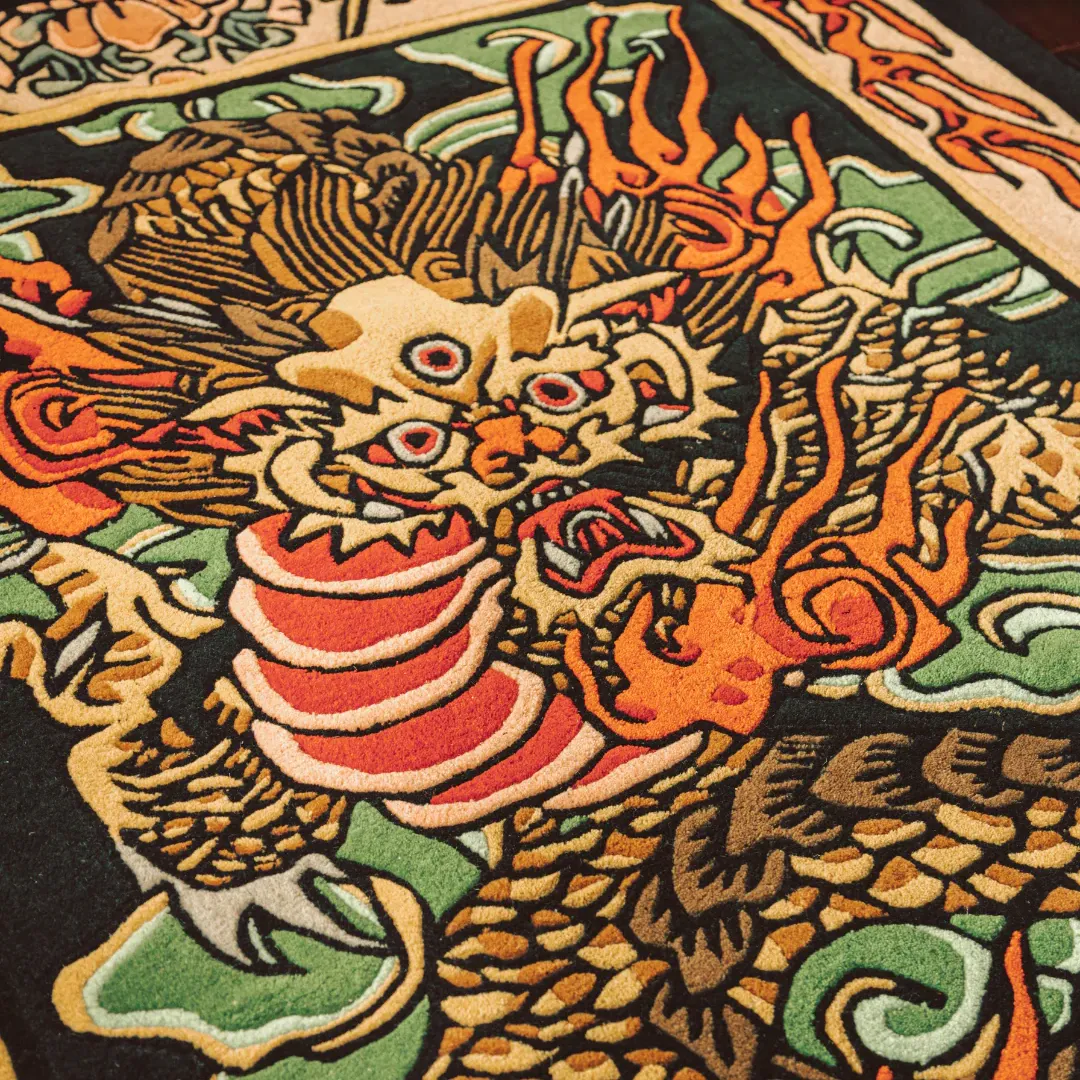 Fireborne Rug Hand-tufted wool rug showcasing a mythical dragon and fire motif – Fireborne Spirit Tattoo Rug