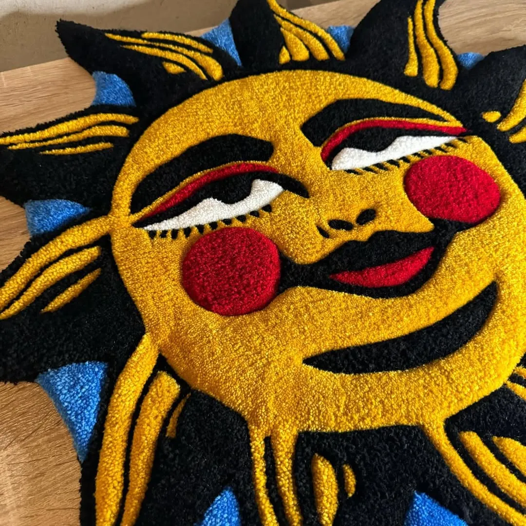 Solar Rug Hand-tufted wool rug showcasing bold tattoo-inspired sun illustration – Solar Smile Rug by Sneagear