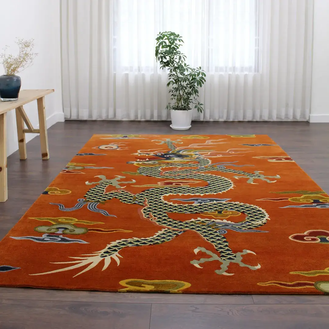 Ember Rise Luxury Dragon Rug Living Room The Ember Rise rug styled in a bright room with white curtains, displaying the full length of the oriental dragon motif as a statement piece for a living area.