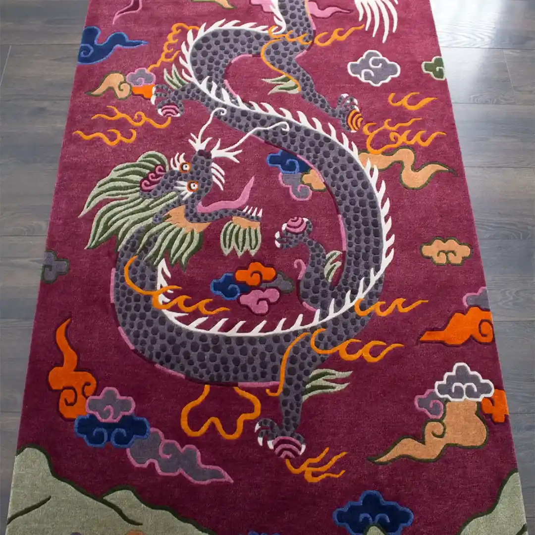 Hand Tufted Dragon Rug Purple And Grey Angled perspective of the Crimson Omen rug highlighting the intricate hand tufted details of the dragon head and the vibrant orange and blue cloud motifs.