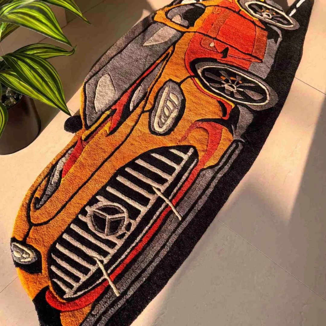 racing gold rug car grille detail Perspective view of the Racing Gold rug on a tiled floor, showcasing the dynamic shape and bold racing livery colors perfect for a car enthusiast's room.