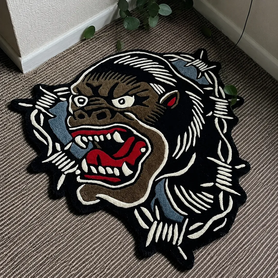 Angle view of the handmade King Kong tufted rug showcasing its unique organic contours and fierce snarling expression on a carpeted floor.