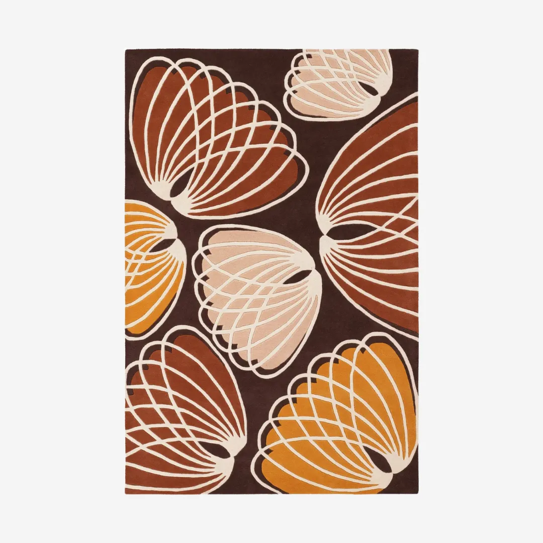 Rectangular wool rug with orange and brown leaf design