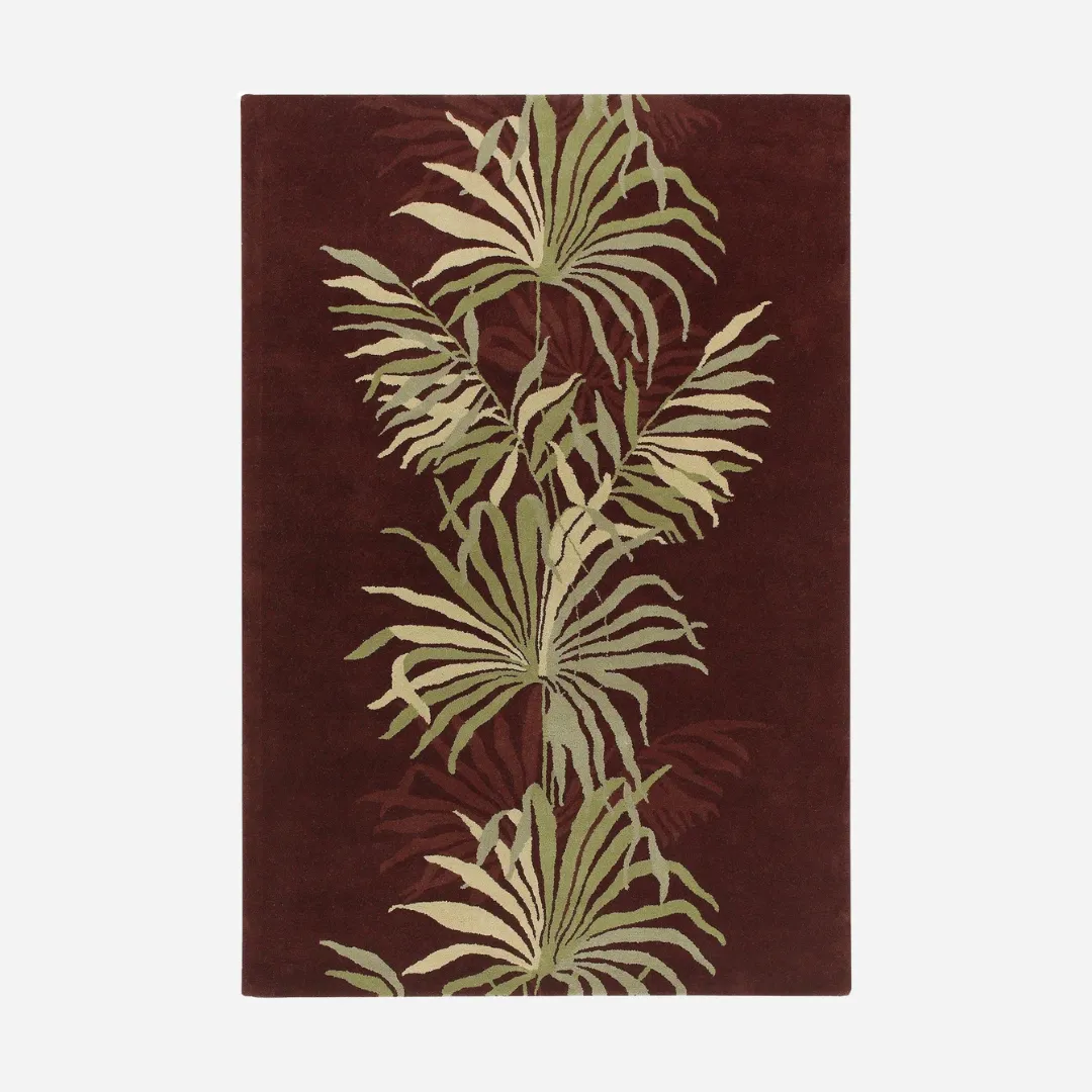 Tropical fern wool rug with green leaves on burgundy base