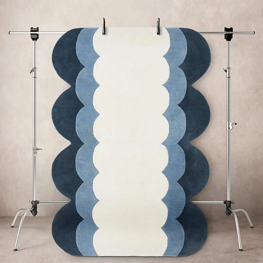Gradient blue and cream runner rug in hallway