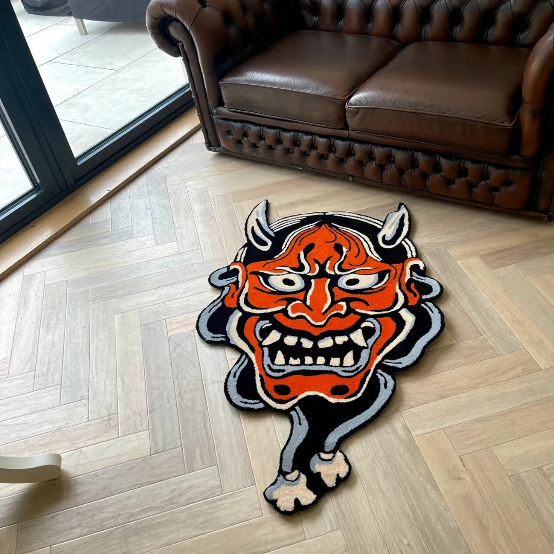 Red Hannya Mask Rug in custom shape on wooden floor