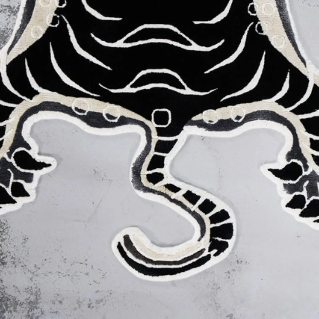 Detailed tiger features in bold black-and-white tones on the Shadow Stripes Wool Rug