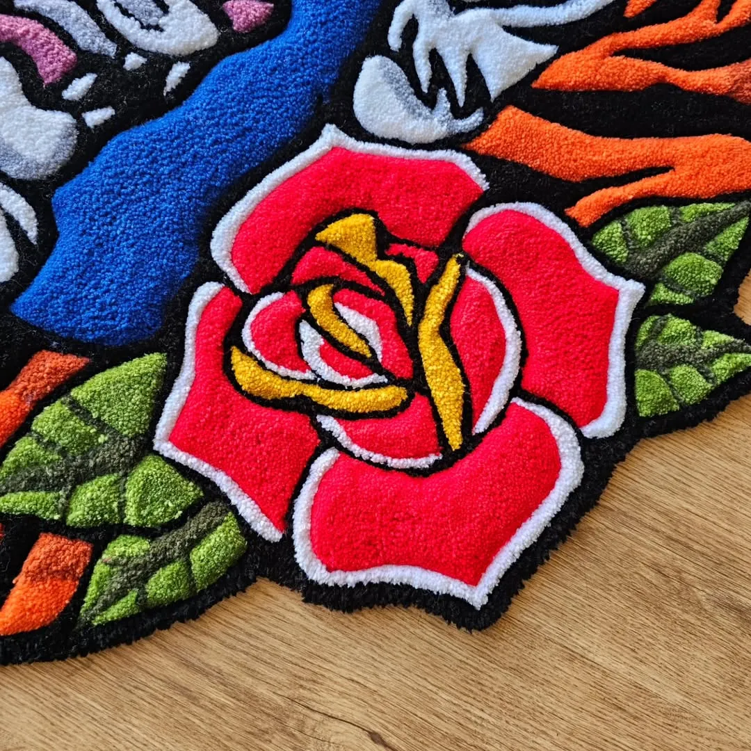 Twin Fury Tattoo Rug Hand-tufted tiger rug with bold orange stripes and red rose accent – Twin Fury design