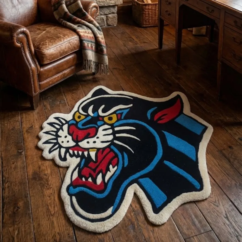 night howler inked panther rug living room Angled view of the Night Howler Inked Rug placed on a wooden floor near a leather armchair, featuring a bold traditional tattoo-style roaring black panther design.