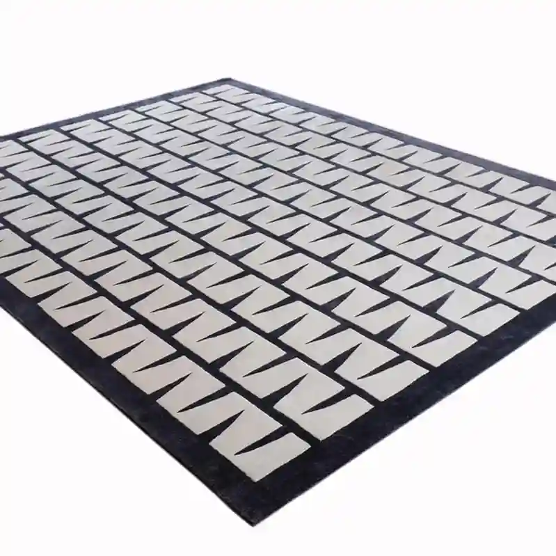 black & white geometrical hand tufted rug
