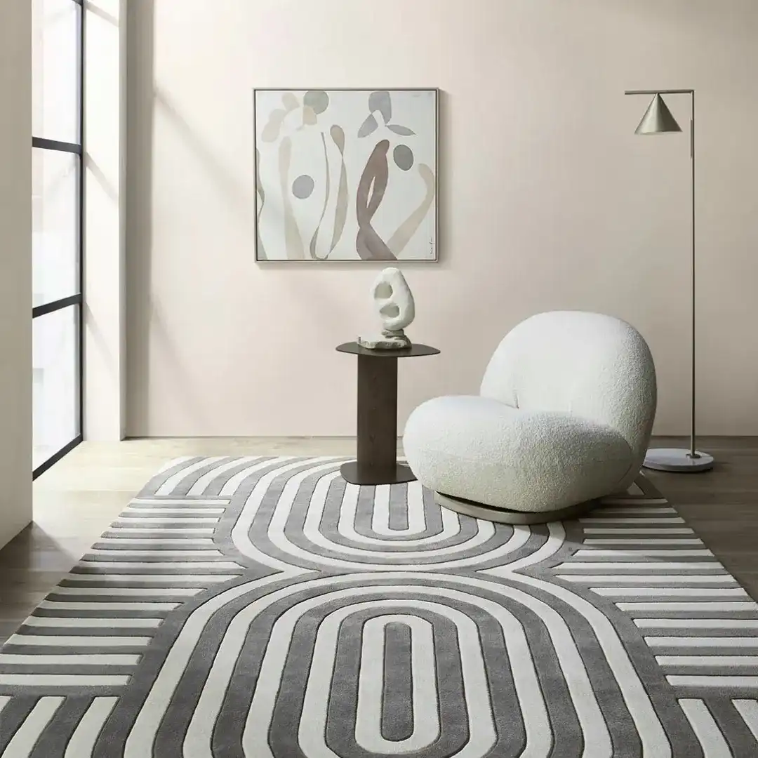 gray and white hand tufted solid rug